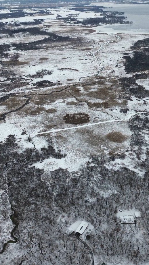Winter aerial view of the property